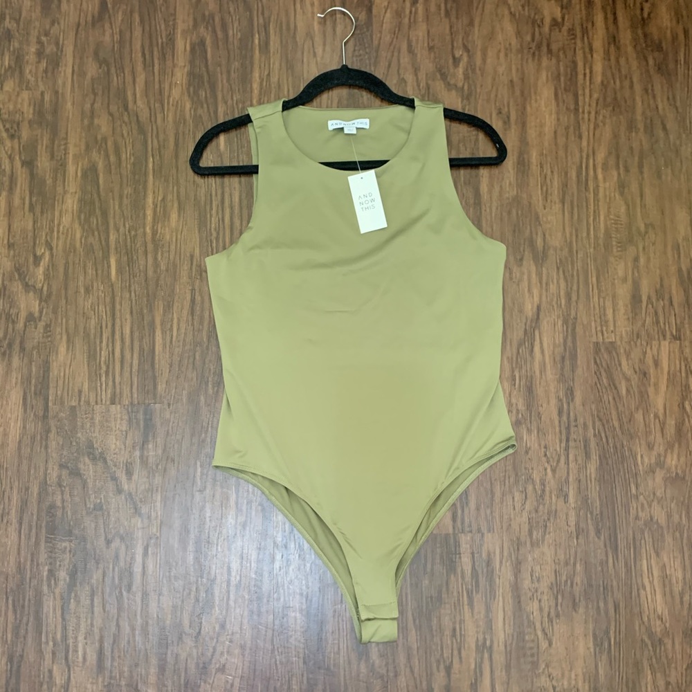 And now this  bodysuit in Olive color size L
